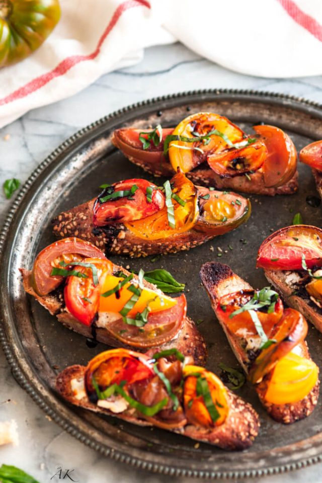 roasted-heirloom-tomato-basil-and-goat-cheese-bruschetta-680x1024 (1)